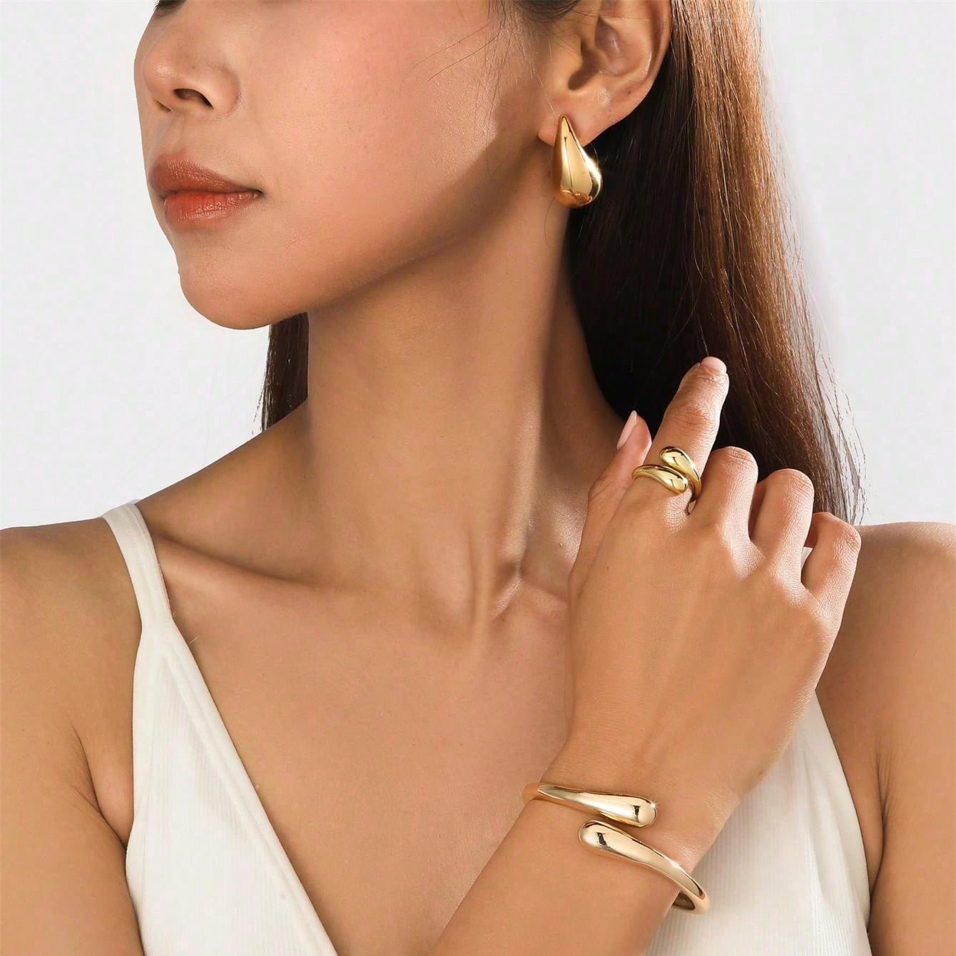 Brincos Gota em Aço